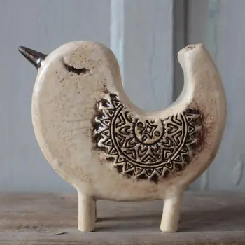 

Ceramic figurine. Clay and Smyk. Handmade. The Bird of Happiness. Milk color. Decor