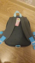 Mochila de grado alto para bebés y niñas, morral escolar 3D antipérdida con dibujos animados para guardería, impermeable de dinosaurios
