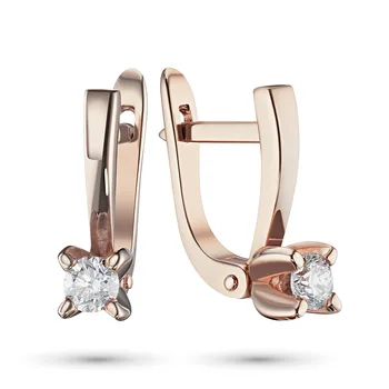 

Earrings in red gold with a diamond