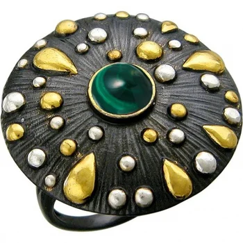 

Esthete ring with black silver Malachite with gilding