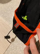 Aonijie-Bolsa para cintura al aire libre para correr, paquetes de cintura ultraligeros portátiles, soporte de teléfono para acampar, con frasco blando de agua