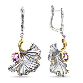 

Earrings made of silver with garnet and Topaz