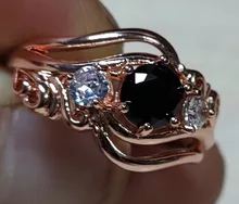 Huitan-Anillo de bruja para mujer, piedra negra única, ajuste giratorio, Diseño de banda, Color oro rosa, anillos de dedo de compromiso para mujer, venta al por mayor