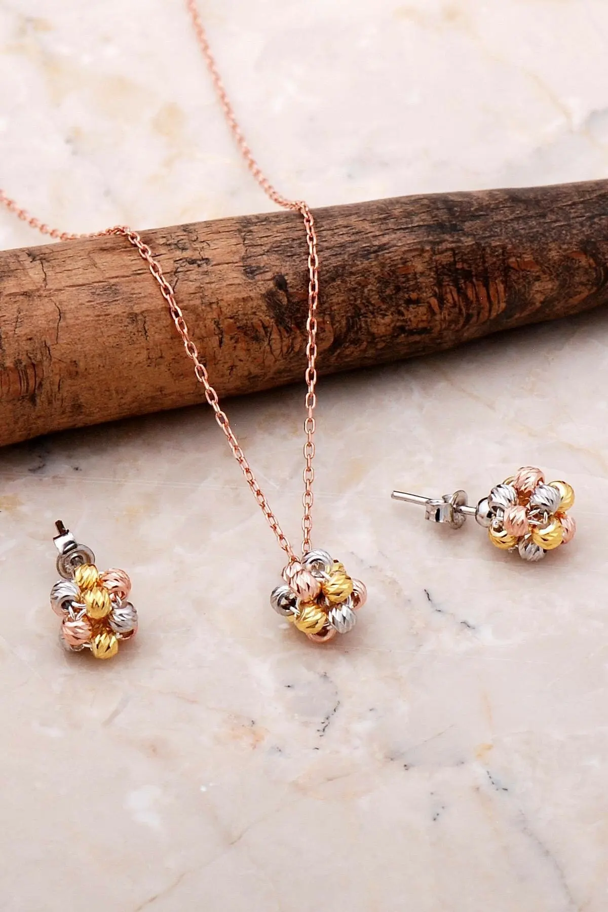 

Dorissa Gold Gilded Rose Silver Set