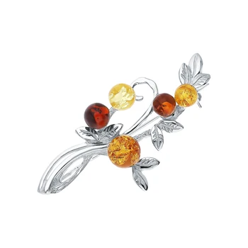 

Silver brooch with amber sunlight