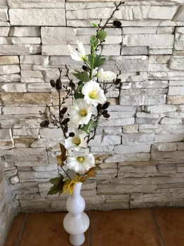 

Composition white glass vase with branches and Flower