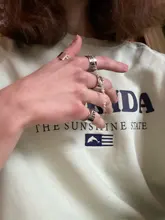 Anillos Pop Punk para hombre y mujer, cadena ajustable multicapa, cuatro anillos abiertos para dedos, de aleación, giratorios, regalo de fiesta