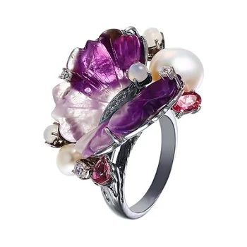 

Jay VI ring with a scatter of colored stones made of black silver