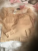 Blusa de manga larga ahuecada con volante elegante para otoño, camisa Sexy de malla transparente con cuentas y cuello redondo para mujer