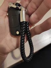 LLavero de lujo de alta calidad para coche, hebilla de herradura giratoria de 360 grados, cuero tejido a mano, colgante de bolso de Soporte para Llaveros para hombre y mujer