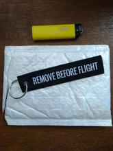 Llavero tejido con etiqueta rótulo de equipaje especial, llavero de cadena roja para regalo de aviación, OEM, joyería de moda