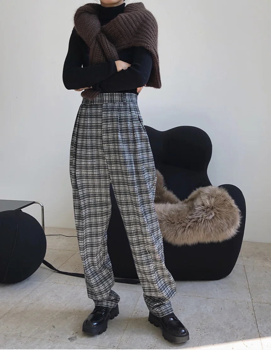 

woman long woolen trousers from set without jacket