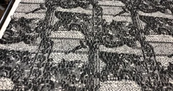 

Black and white mesh fabric. Stretchy mesh lace