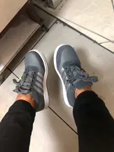 Zapatos de seguridad de cuero para hombre y mujer, botas de trabajo a prueba de perforaciones y golpes, zapatos protectores ligeros, suela de goma para exteriores