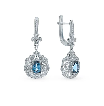 

Gold earrings with Topaz and diamonds sunlight sample 585