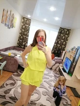 Hirigin casuales de las mujeres volantes lisos Clubwear vacaciones de verano sin mangas mameluco Mini pantalones cortos de playa