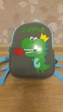 Mochila de grado alto para bebés y niñas, morral escolar 3D antipérdida con dibujos animados para guardería, impermeable de dinosaurios