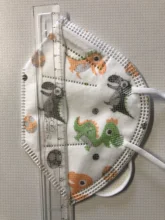 Mascarilla KN95 reutilizable con estampado de dinosaurio para niños, máscara protectora, 10/20/50/100 Uds.