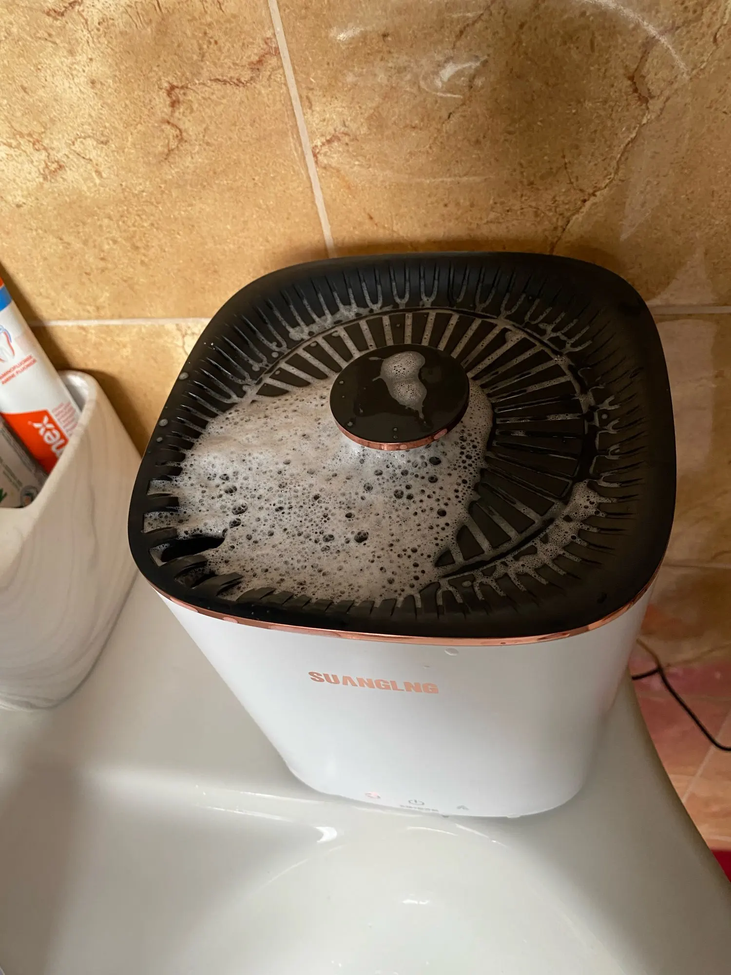 Attachment image review on An ultra-fast portable washing machine for home and travel