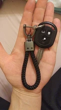 LLavero de lujo de alta calidad para coche, hebilla de herradura giratoria de 360 grados, cuero tejido a mano, colgante de bolso de Soporte para Llaveros para hombre y mujer