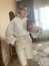 Blusa con manga de linterna para mujer, camisa holgada con botones a la moda para primavera y otoño, Color liso