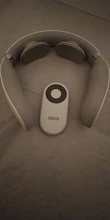 Masajeador de Cuello SKG 4098 Blanco Controlador Remoto Estructura de Anillo Inteligente Masajeador para Incomodidad de Cuello Masaje de Pulso Eléctrico Larga Duración de Bateria Calentamiento