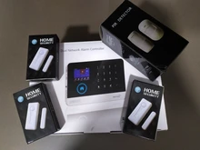 Inalámbrico Tuya APP SIM GSM casa RFID de seguridad antirrobo LCD teclado táctil sistema de alarma WIFI/GSM kit de Sensor ruso español voz