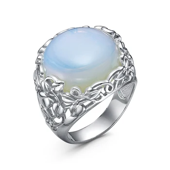 

925 sterling silver ring with stones: synth Moonstone.