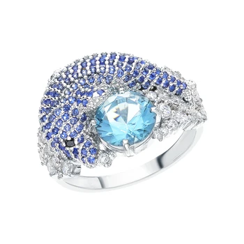 

Silver ring with cubic zirconia and Topaz imitation sunlight sample 925