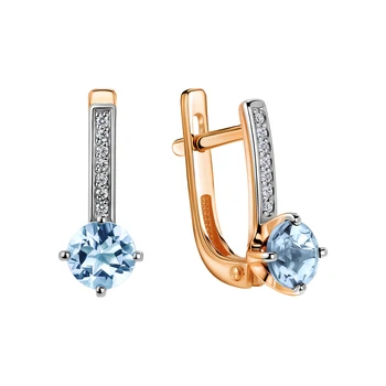 

Gold earrings with Topaz and cubic zirconia sunlight sample 585