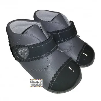 

Booties without sole in leather and gray patent leather for girl, D'bebé