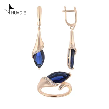 

Huadie jewelry set with zircons for women. Long hanging female earrings-drops with stones. Thin ring. Jewelry 2020