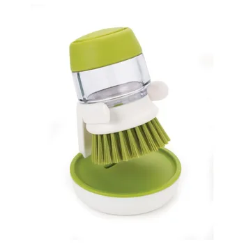 

Brush with detergent dispenser palm scrub