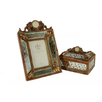 

Frame photo frame with jeweler resin finish ceramic. Measures: 28x18x5 cm.