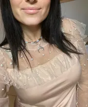 Blusa de manga larga ahuecada con volante elegante para otoño, camisa Sexy de malla transparente con cuentas y cuello redondo para mujer