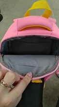 Mochila de grado alto para bebés y niñas, morral escolar 3D antipérdida con dibujos animados para guardería, impermeable de dinosaurios