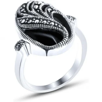 

Silver Wings ring with mother of pearl and marcasite in silver
