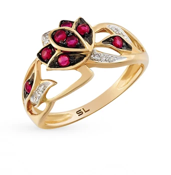 

Gold ring with rubies and diamonds sunlight