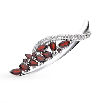 

Silver brooch with Garnet sunlight